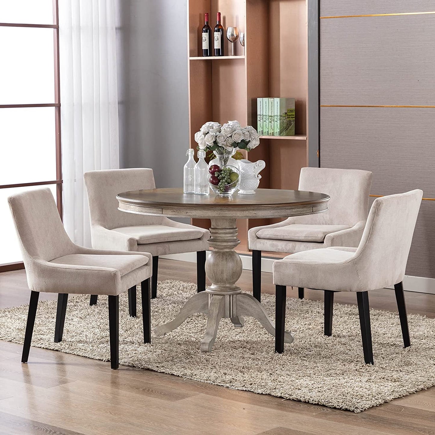 Beige Corduroy Dining Chairs With Wood Legs Set Of 6 around a round dining table in a modern dining room setting.
