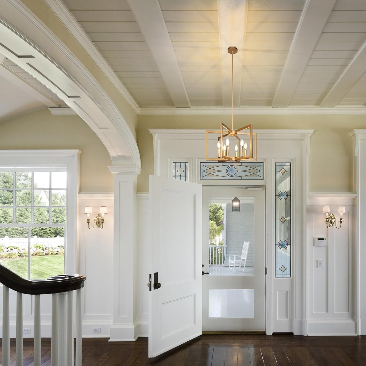 Six Light Gold Pendant Light Modern Farmhouse Chandelier hanging in a stylish entryway with ample natural light.