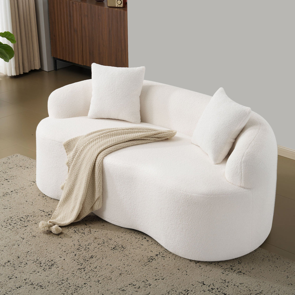 White Curved Loveseat Sofa with Round Armrest