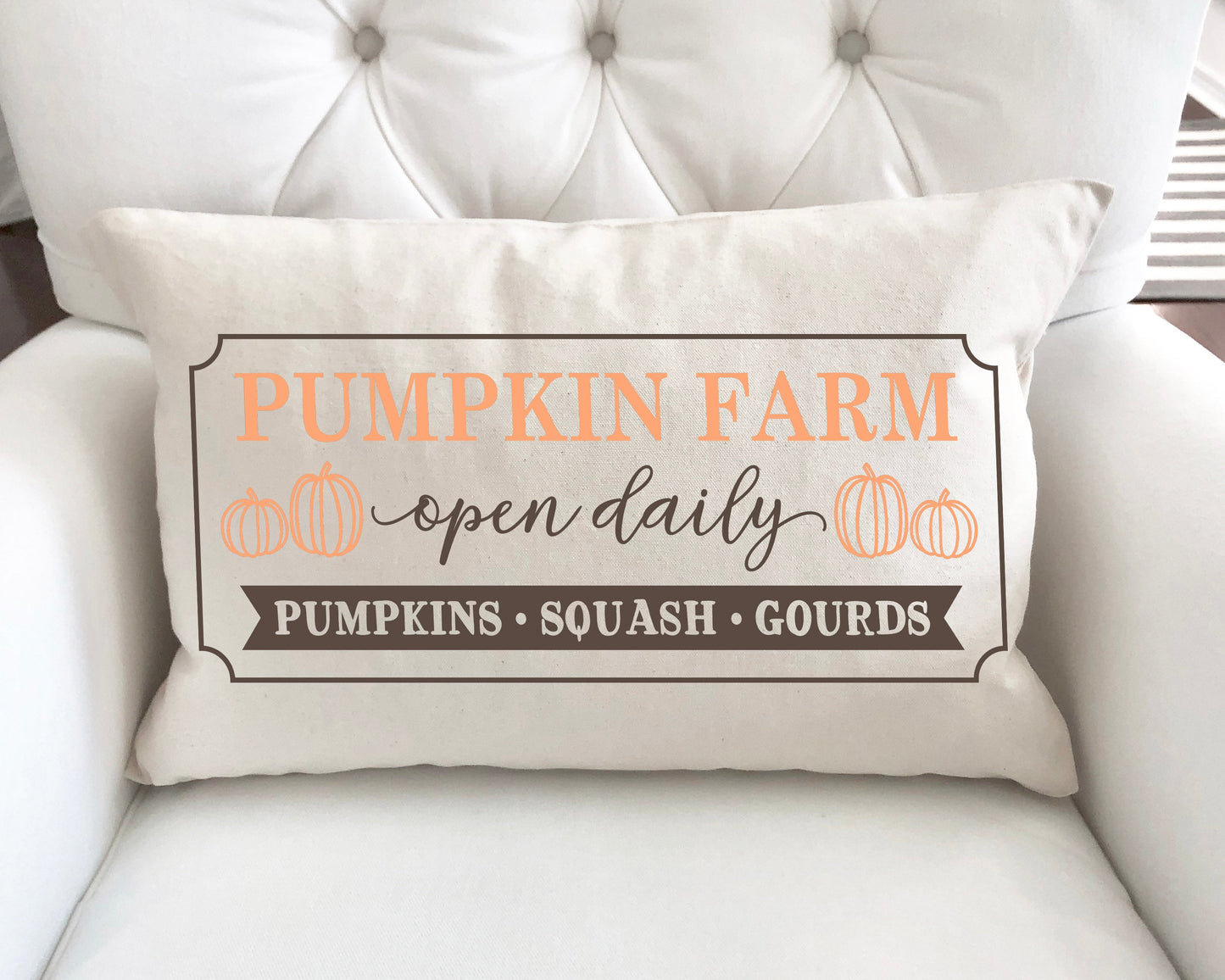 Pumpkin Farm Open Daily Pillow Cover 12x20 inch with pumpkins and text on a cozy sofa.