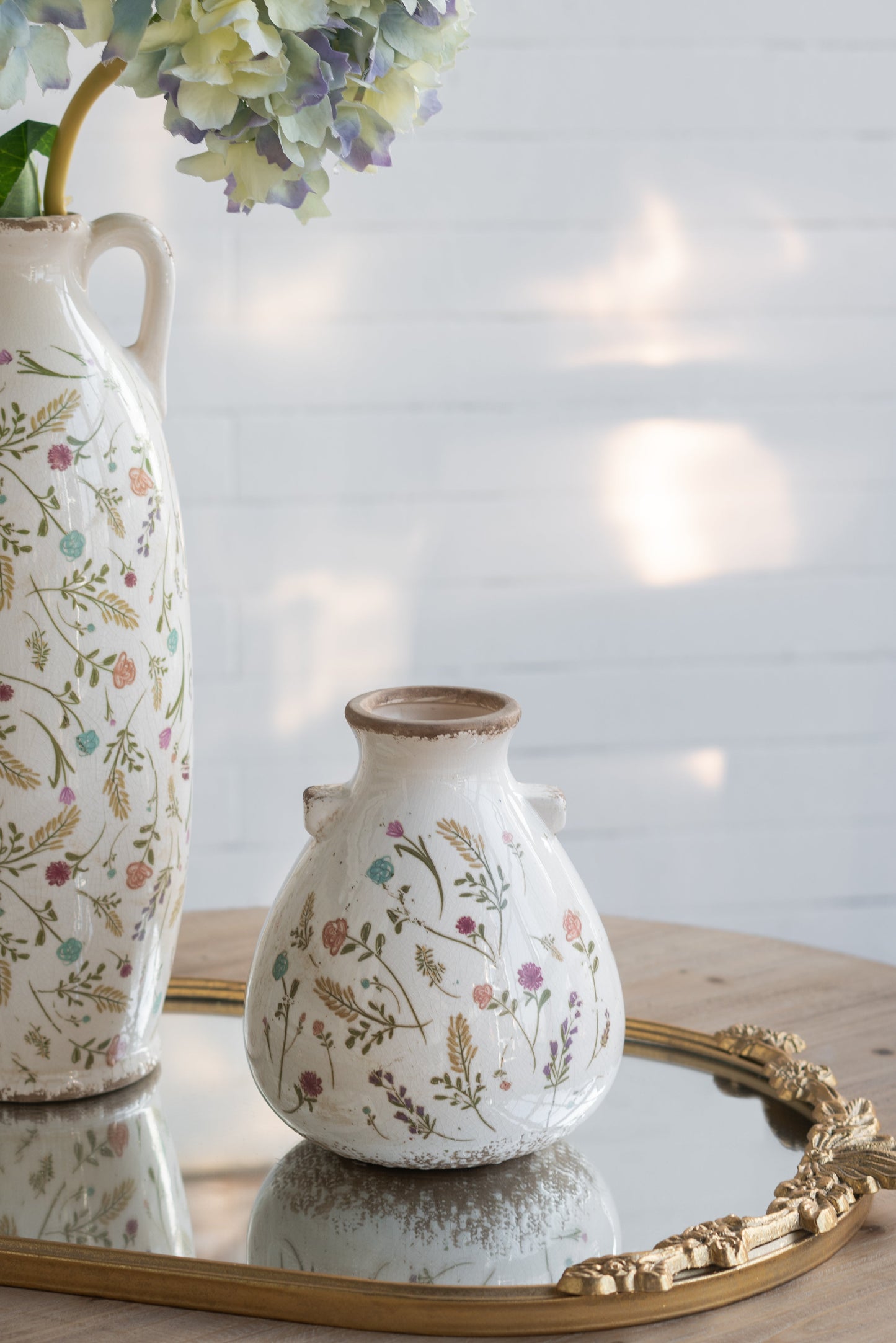 6.7x6.7x7.7" Round Ceramic Accent Vase with Multi-Colored Floral Motifs