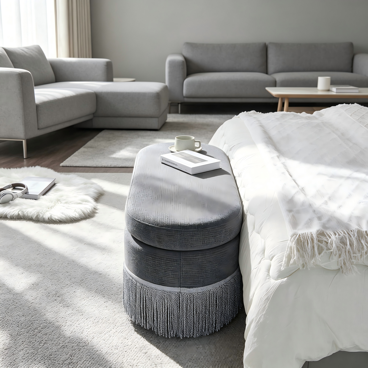 Oval Upholstered Storage Ottoman with Fringe Trim & Lift-Top Lid