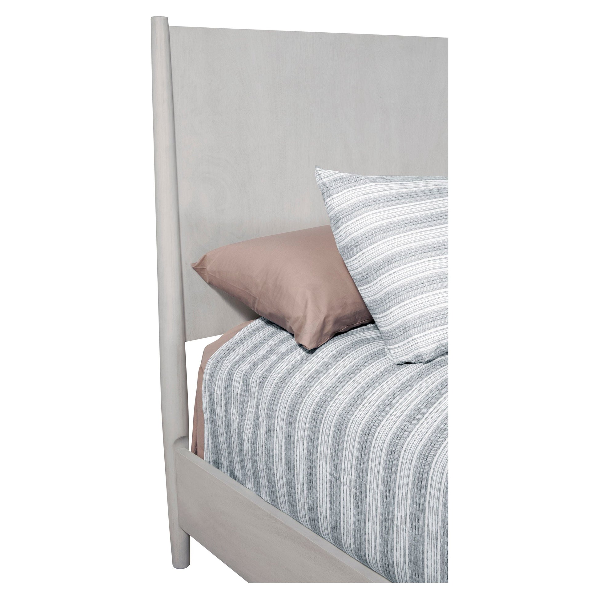 Flynn Panel Bed showcasing gray headboard and stylish bedding with striped design.