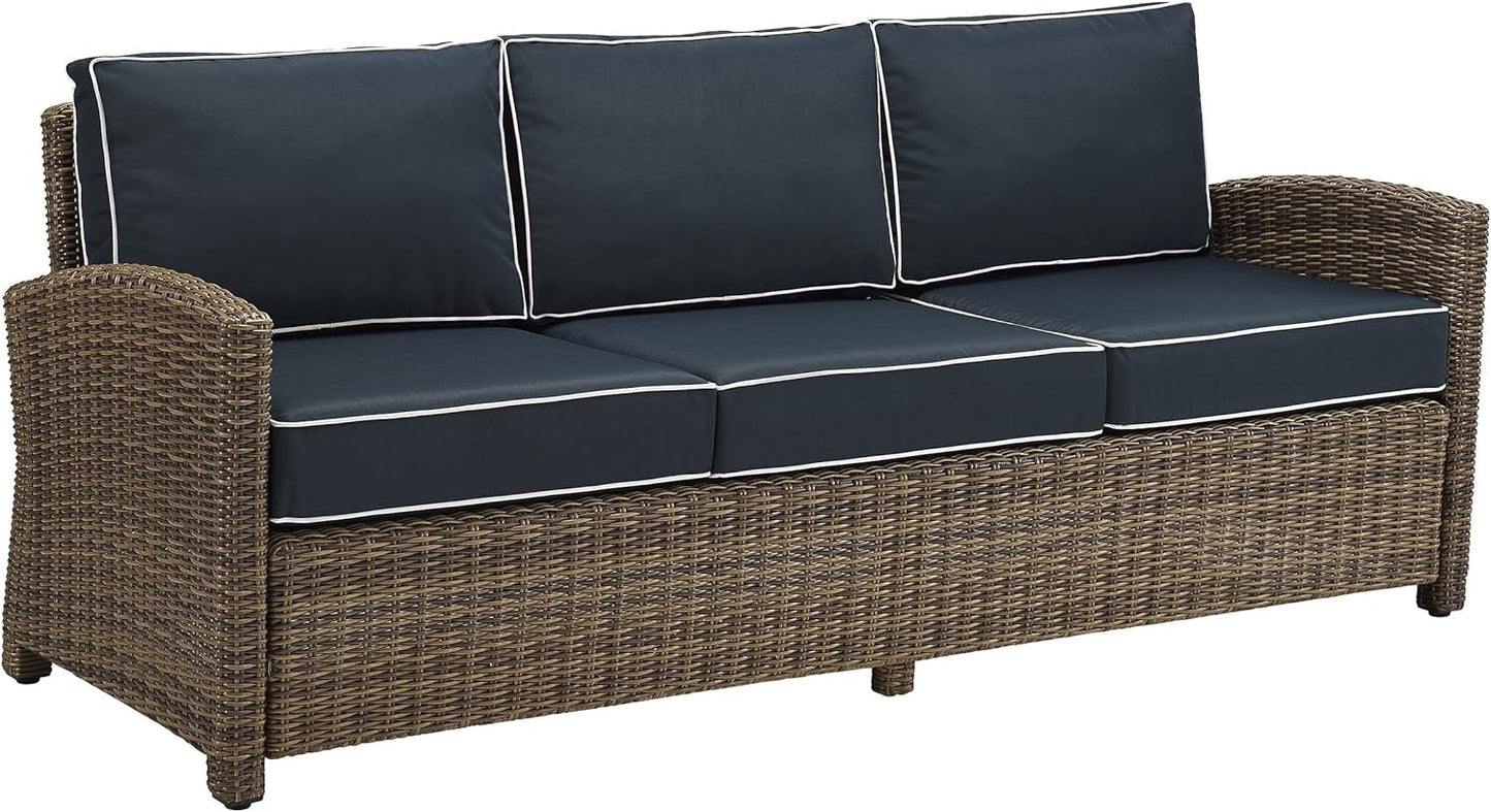 Brown Wicker Outdoor Sofa with Navy Cushions - stylish and durable patio seating for comfort and elegance.