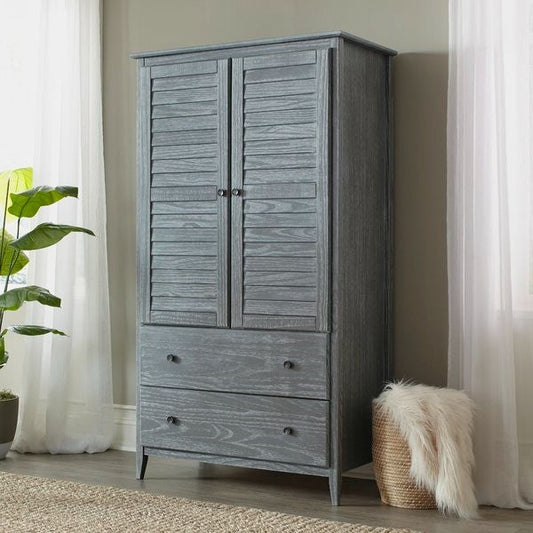 Gray wooden wardrobe with two doors and two drawers in a room with curtains and a plant.