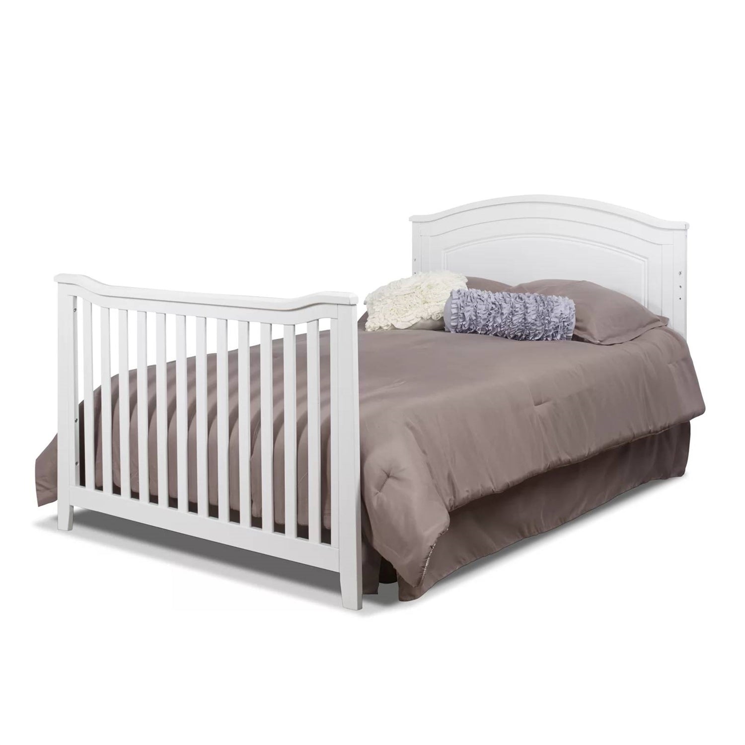 White crib with brown bedding on a white background