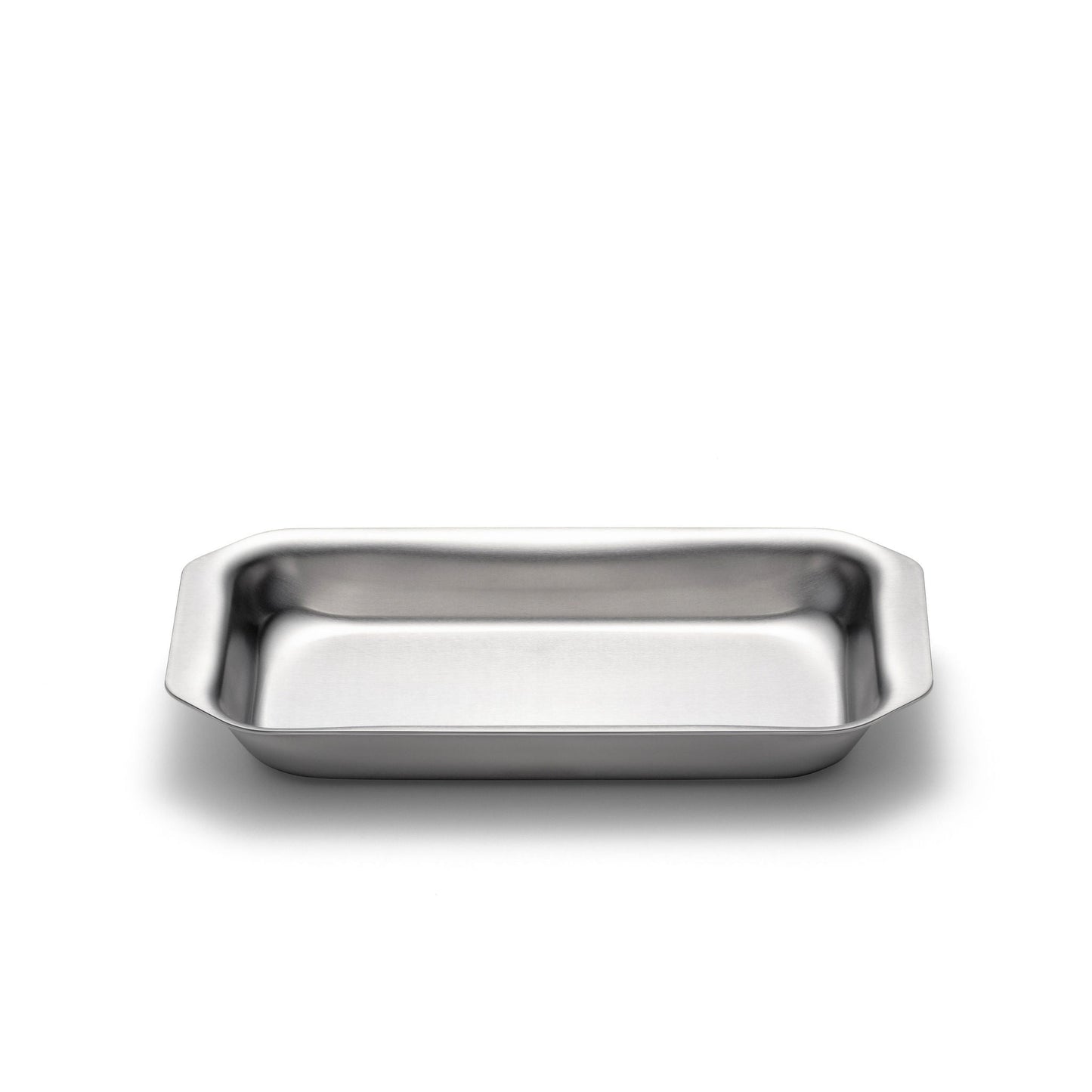 Stainless steel rectangular jelly roll pan on a white background