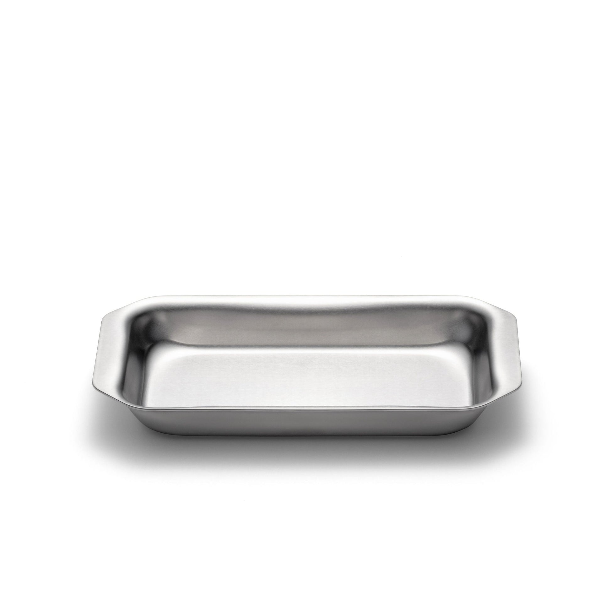 Stainless steel rectangular jelly roll pan on a white background