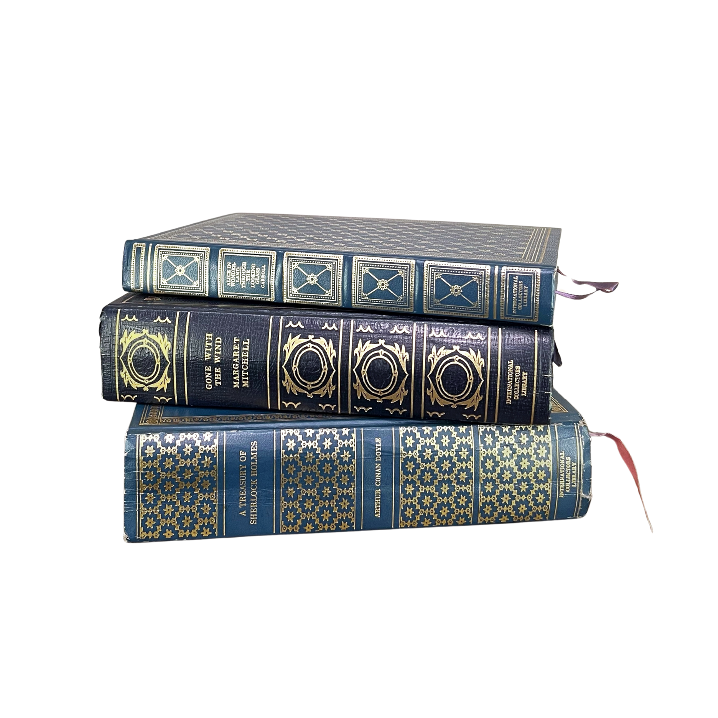 Vintage Blue Gilded Books stacked neatly, showcasing their beautiful gilded bindings and rich blue covers.