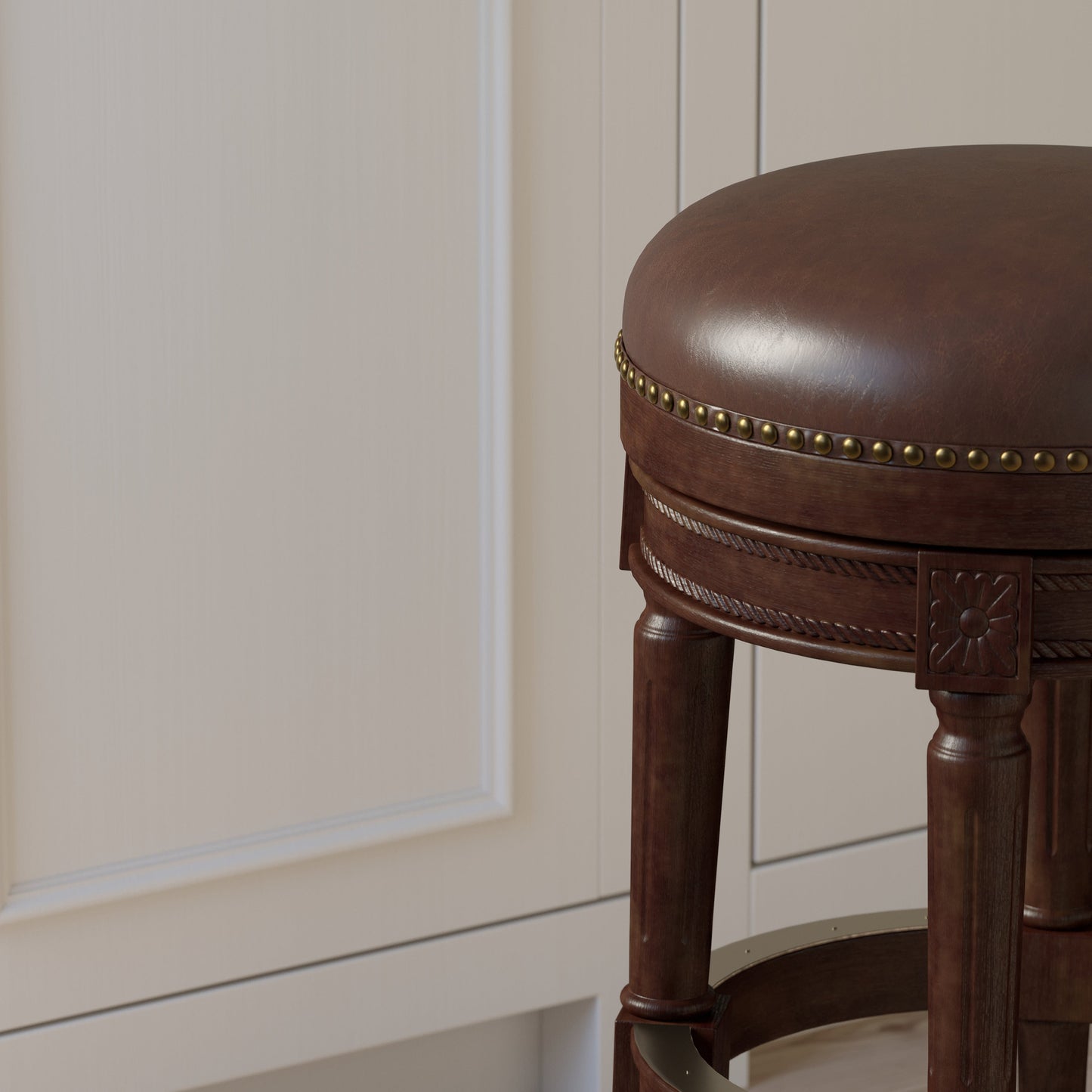 Backless Charlotte Barstool in Distressed Walnut featuring a plush leather seat and wooden legs.