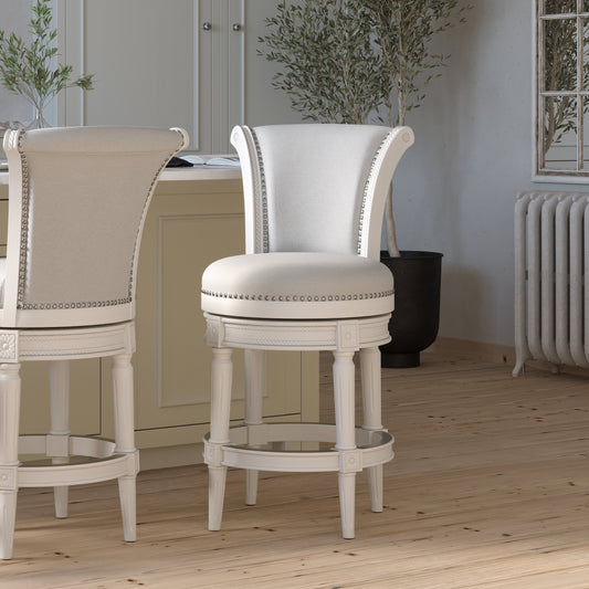 Charlotte Swivel Barstool in White with Grey Fabric, showcasing plush upholstery and elegant design in a modern kitchen setting.