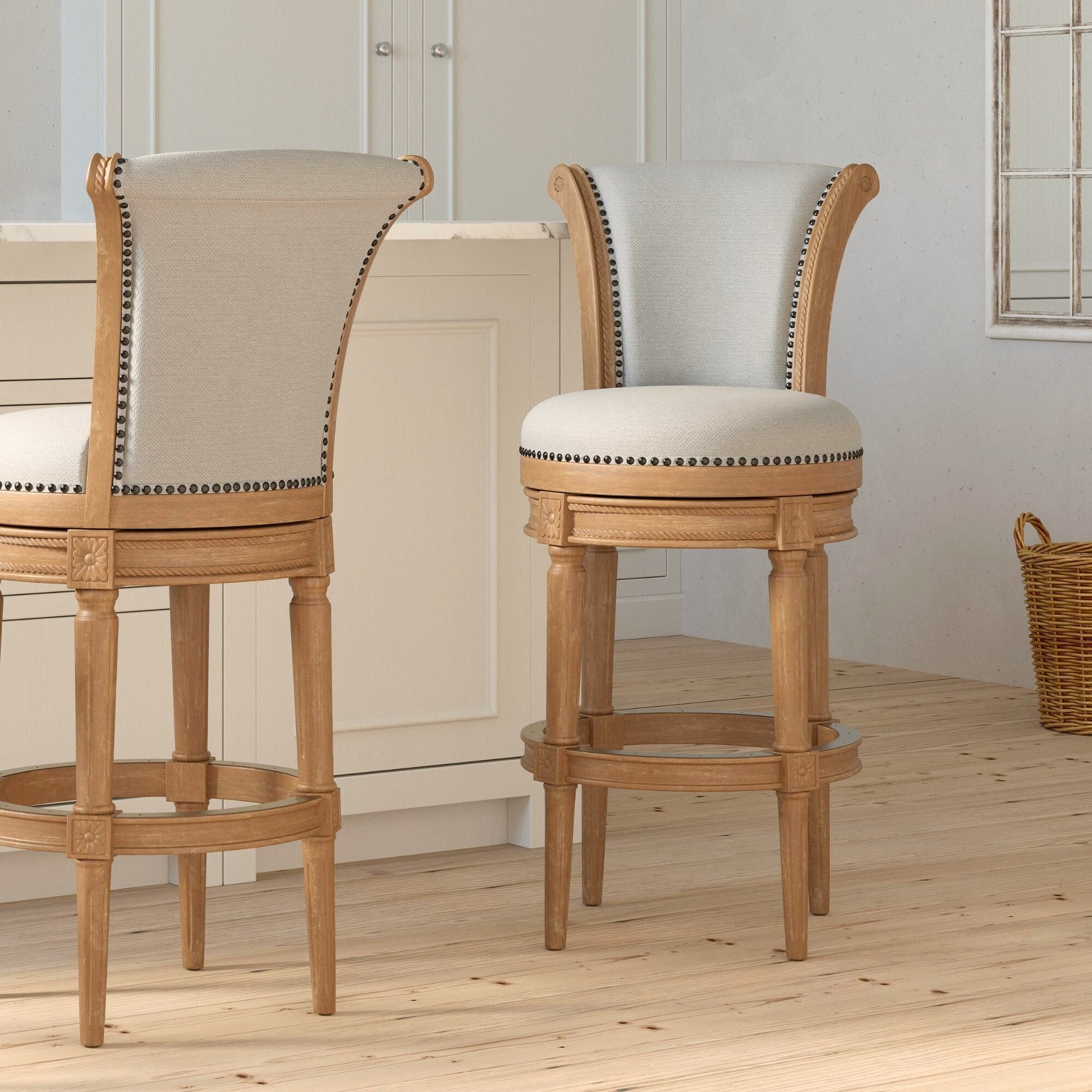 Charlotte Swivel Barstool in Weathered Oak featuring plush seats and hand-crafted details in a modern kitchen setting.