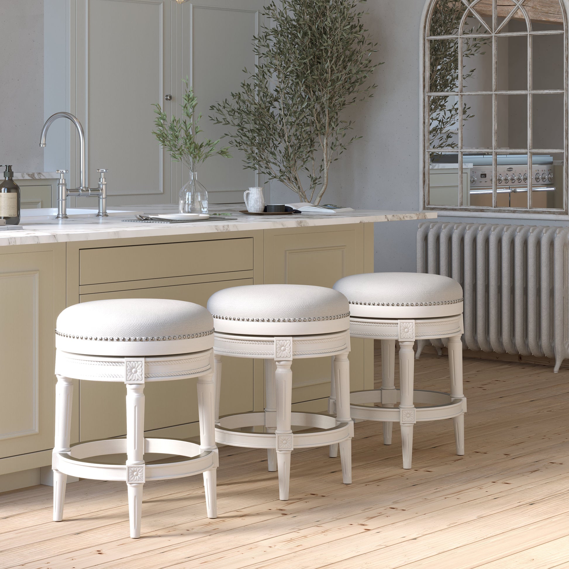 Backless Charlotte Barstool in White set against a stylish kitchen island with neutral decor.