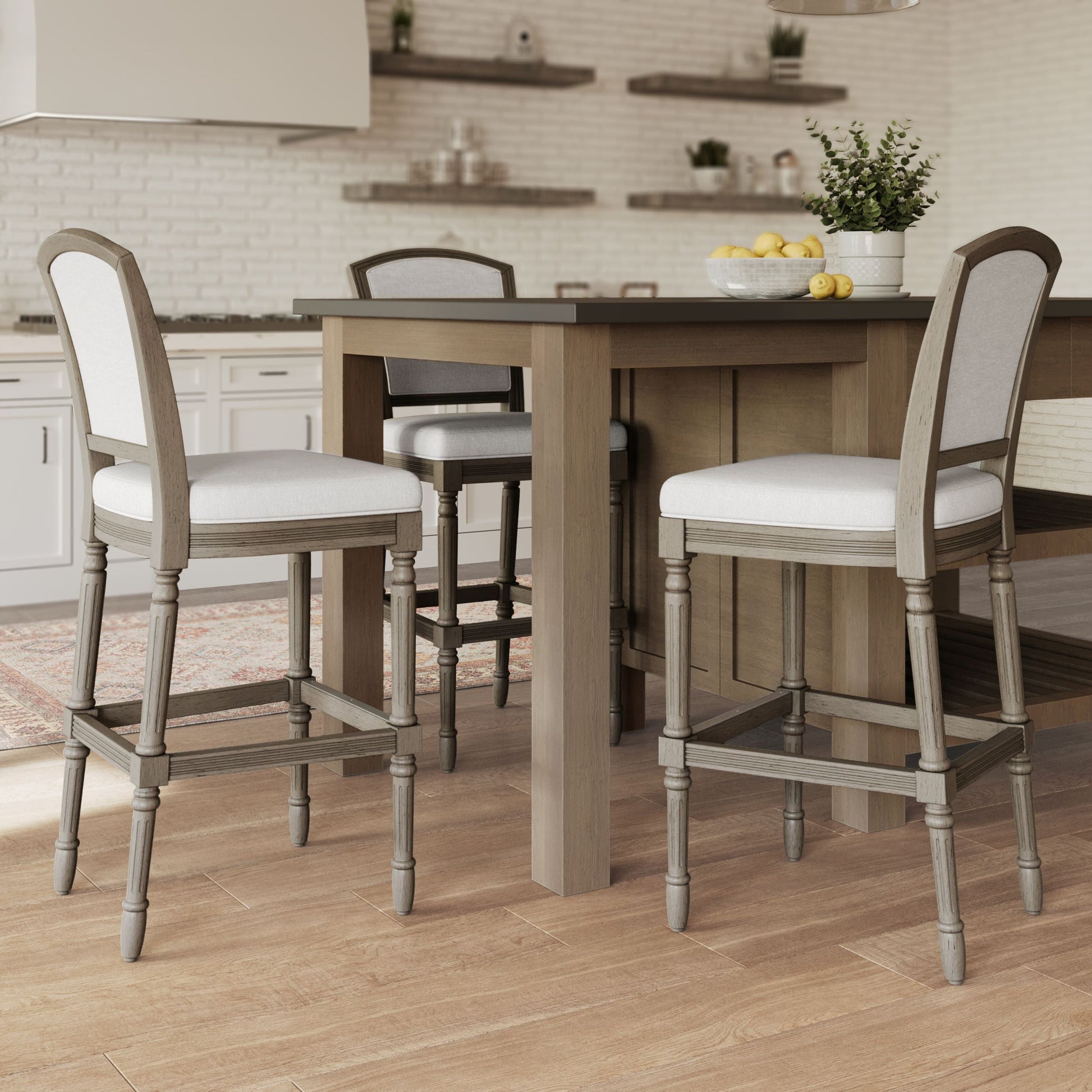 Wilmington Stool In Natural Gray placed around a stylish kitchen counter with a modern design.