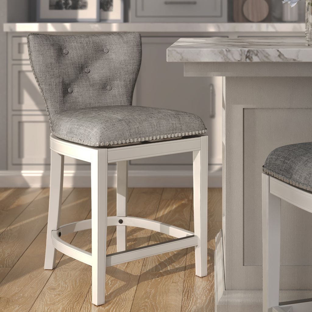 Mebane Stool in White & Grey with hand tufted linen seat and solid wood frame in a modern kitchen setting.