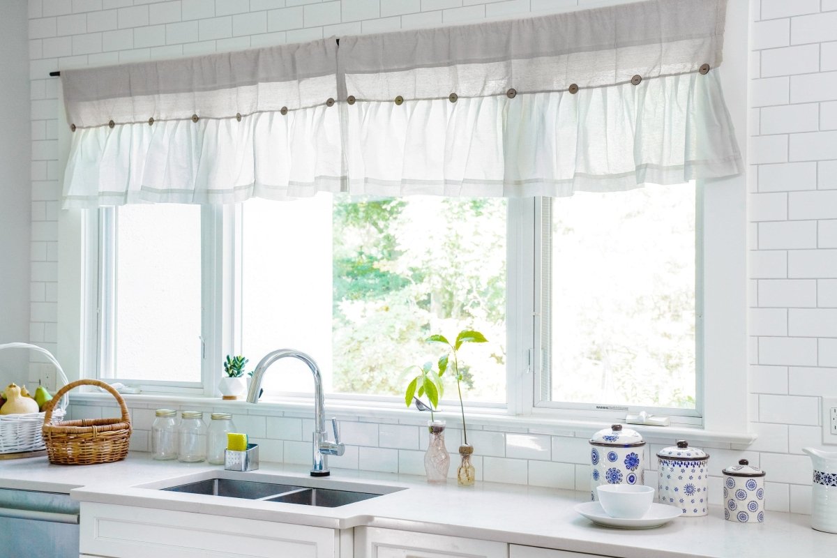 Linen Button Valance adding farmhouse charm to a kitchen window with pleats and buttons.