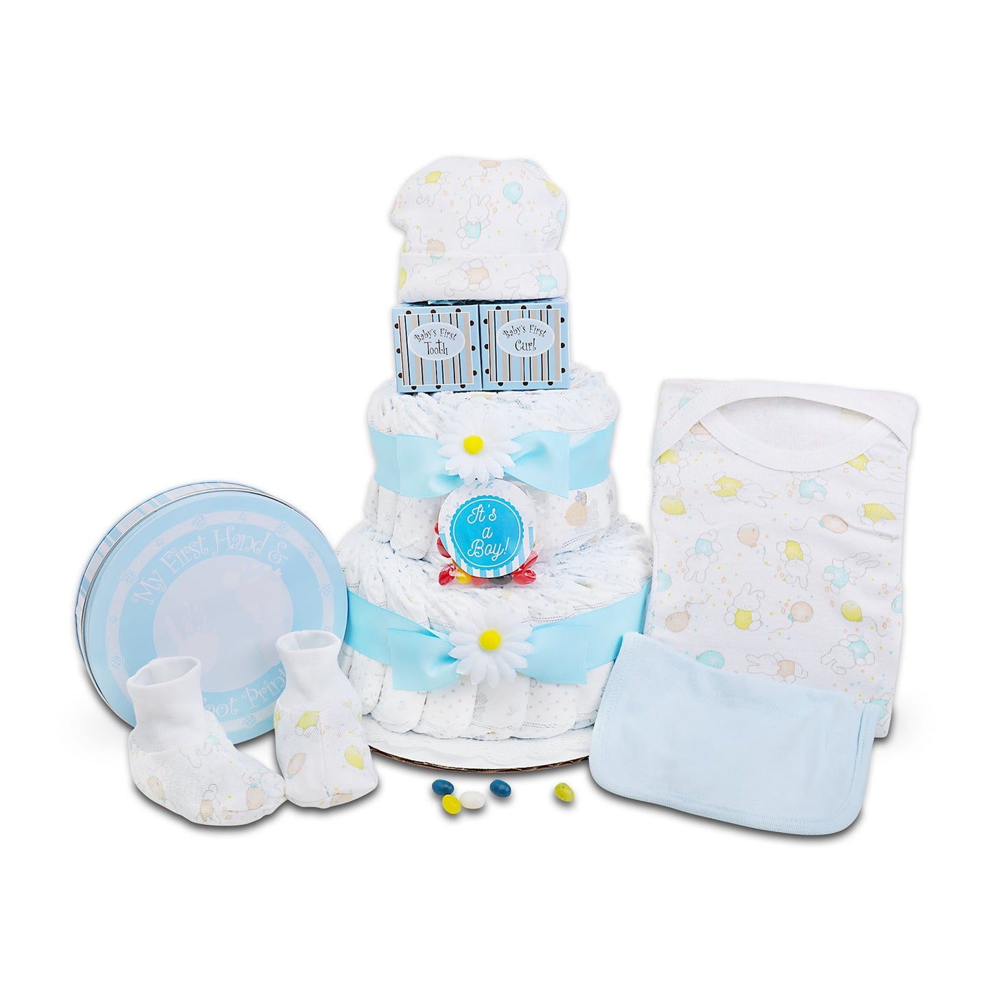 Baby gift set with diaper cake, baby booties, and other items on a white background