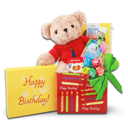 Birthday gift set with teddy bear, candy, and balloons on a white background