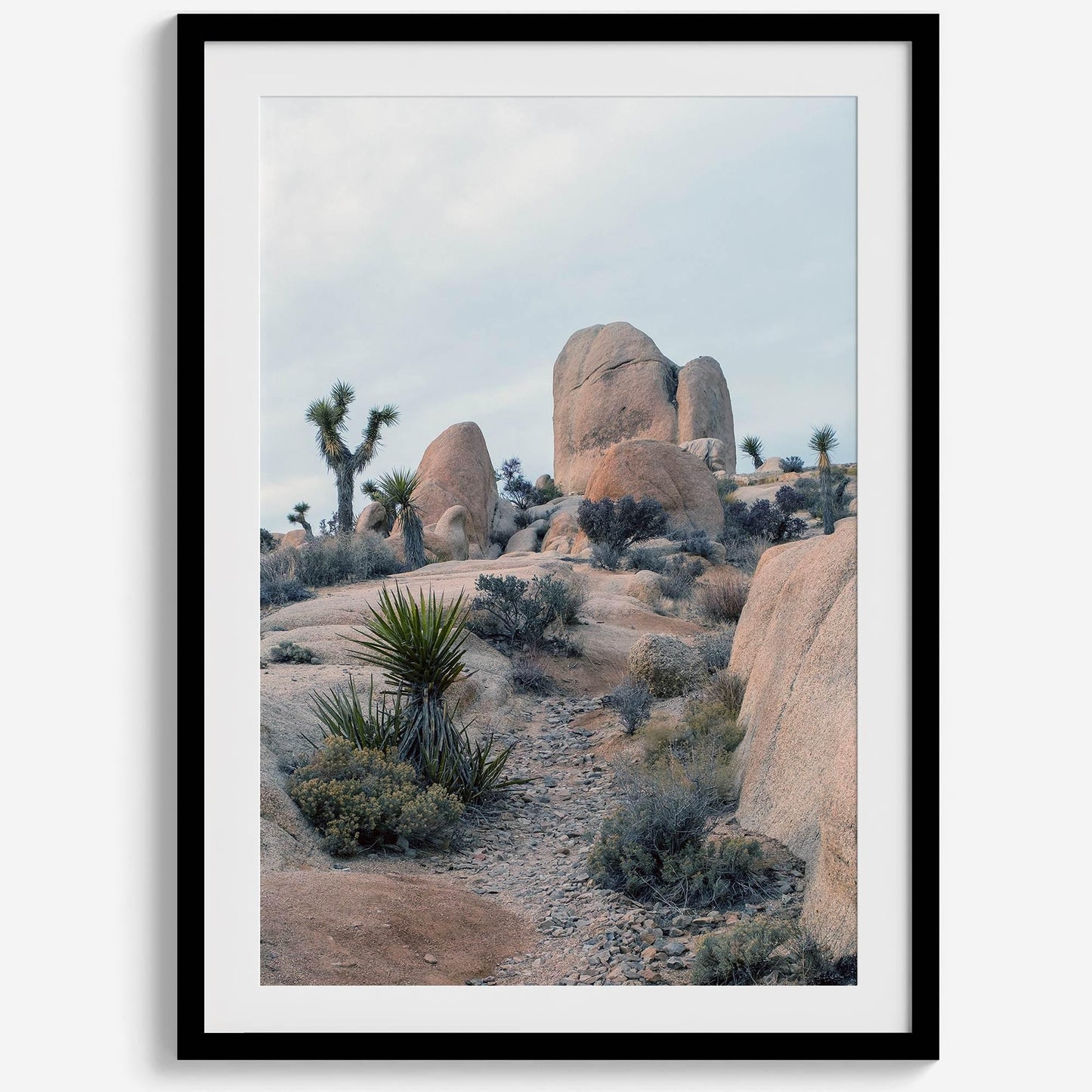 California desert art print featuring Joshua Trees and rock formations in a serene landscape.