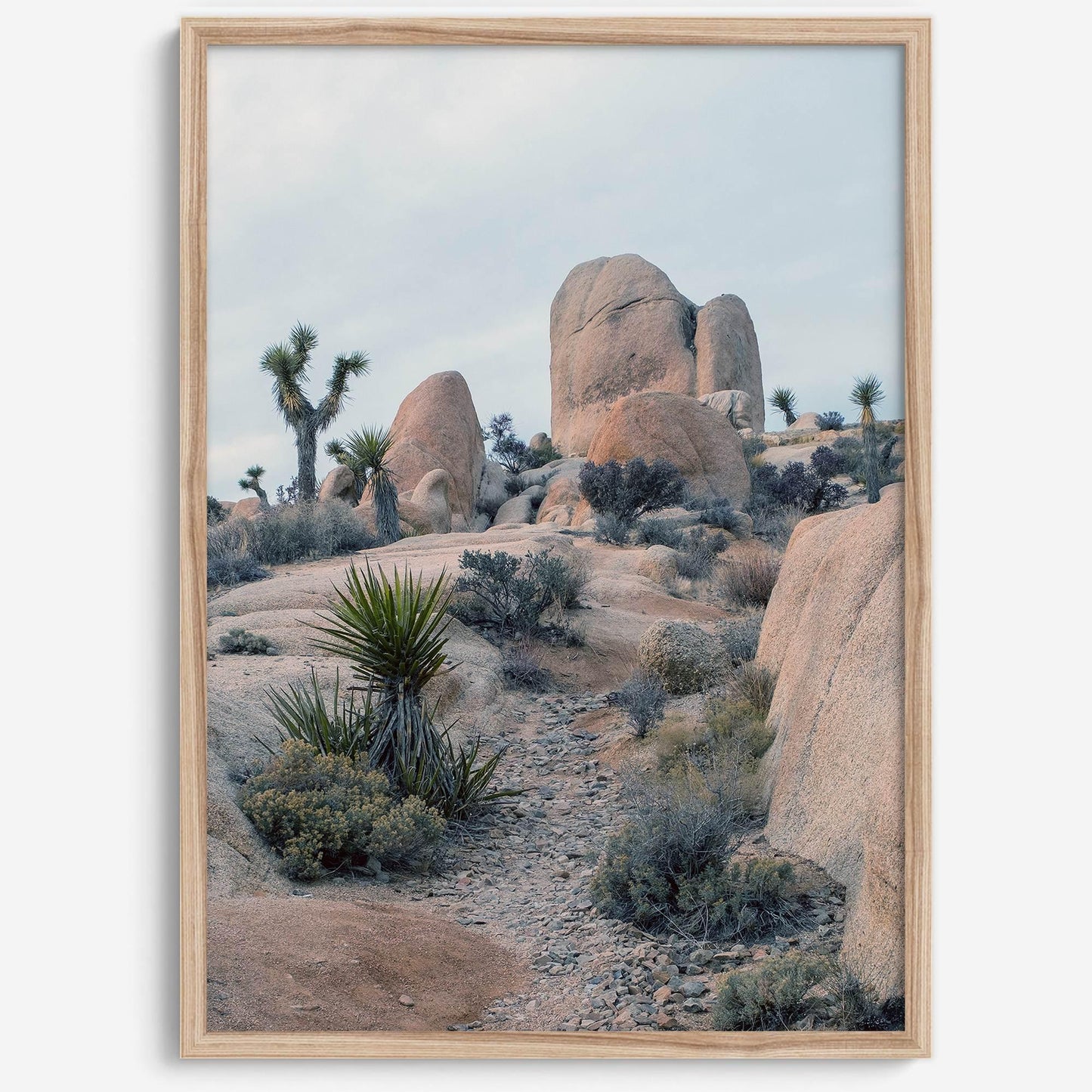California desert art print featuring Joshua Trees and unique rock formations in the desert.