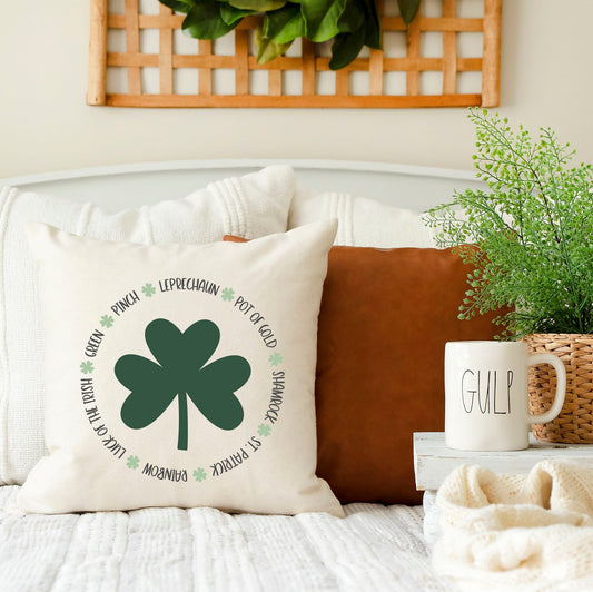 Green Pinch Leprechaun 18x18 inch St. Patrick's Day Pillow Cover on a cozy couch with decorative elements.