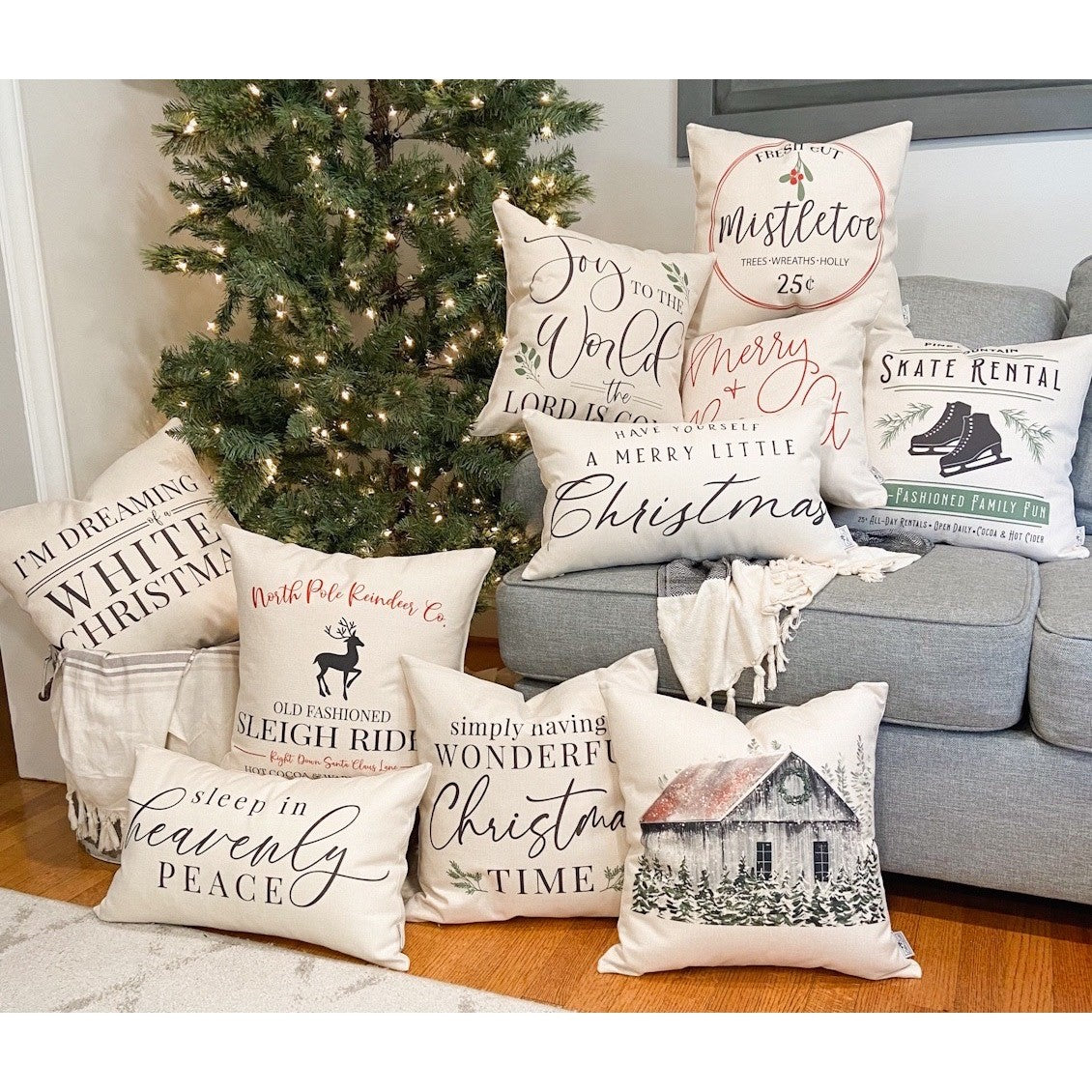 Jingle All the Way Pillow Cover 17x17 inch displayed among festive holiday decorative pillows.
