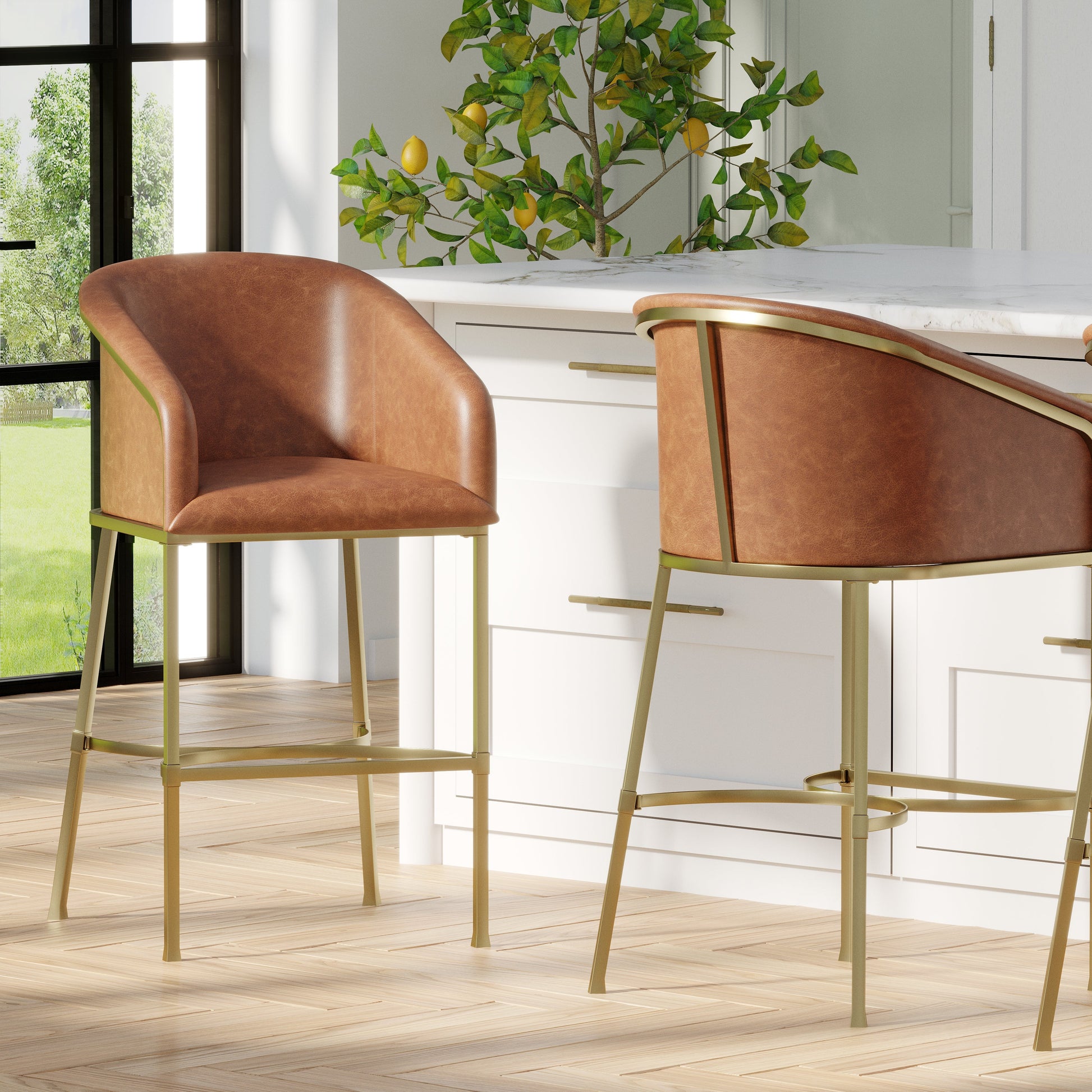 Greensboro Barstool in Brown with brass accents beside modern kitchen island.