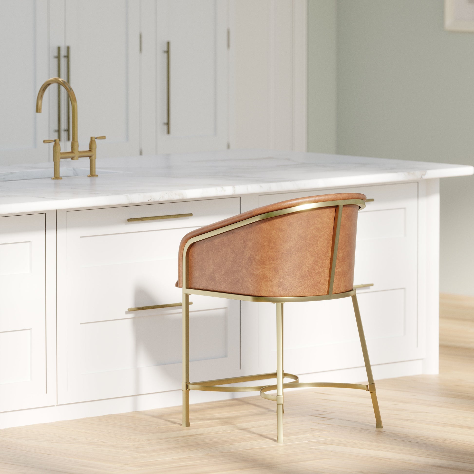 Greensboro Barstool in Brown beside a modern kitchen island with brass accents.