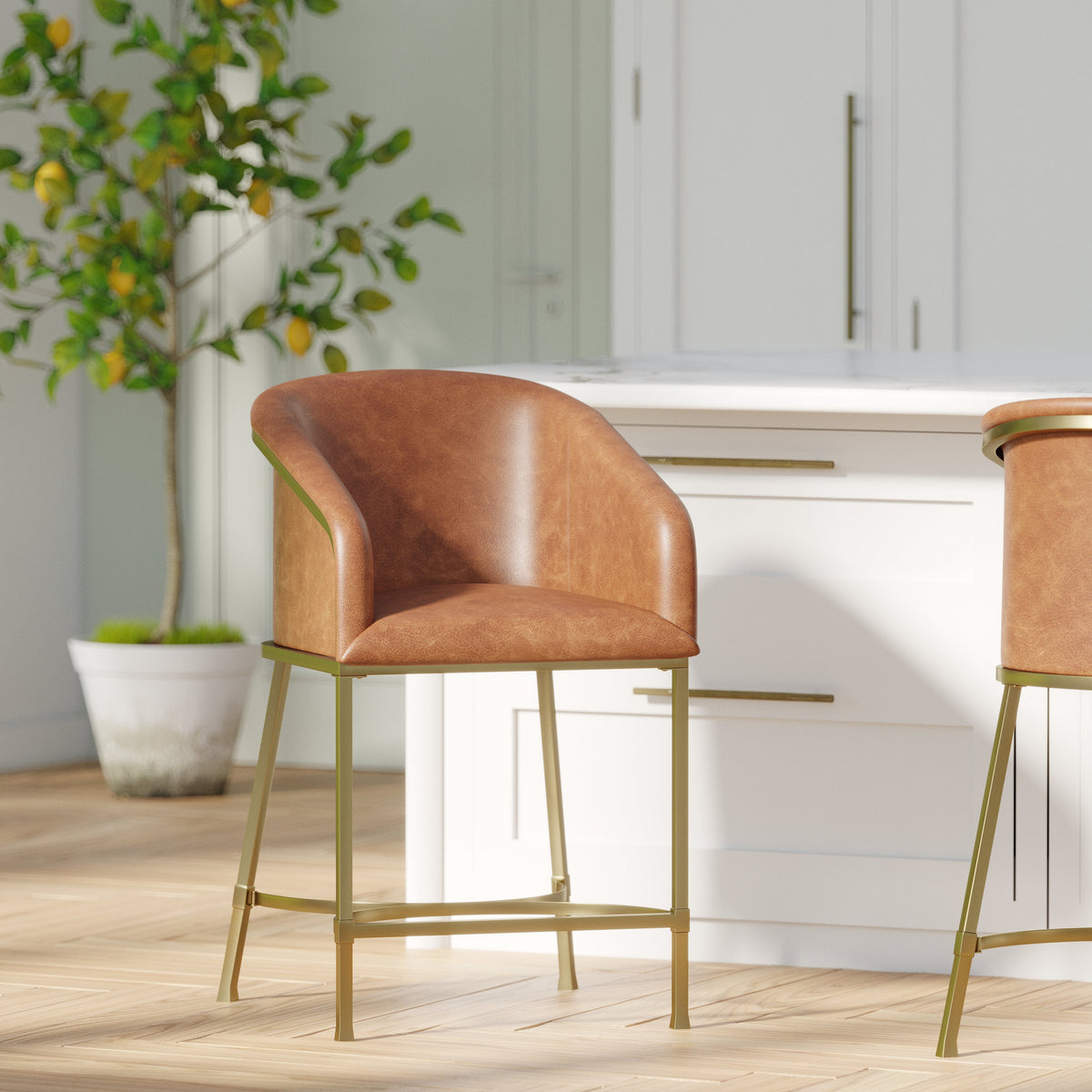 Greensboro Barstool in Brown with PU upholstery and brass legs in a modern kitchen setting.