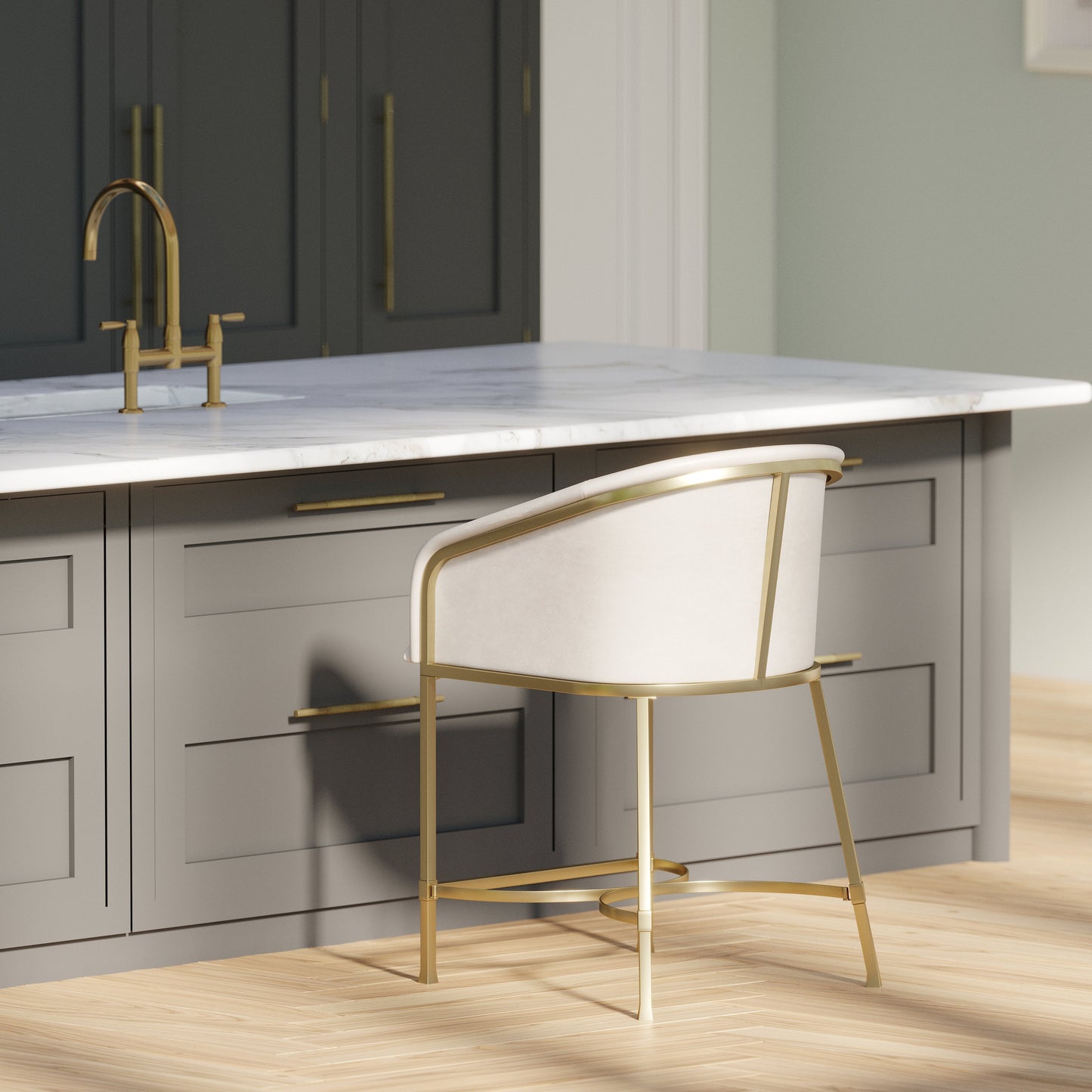Greensboro Barstool in White with brass accents placed at a kitchen counter.