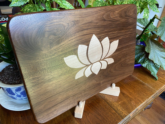 Stunning Walnut charcuterie board with Lotus Flower inlay made from soft Maple.