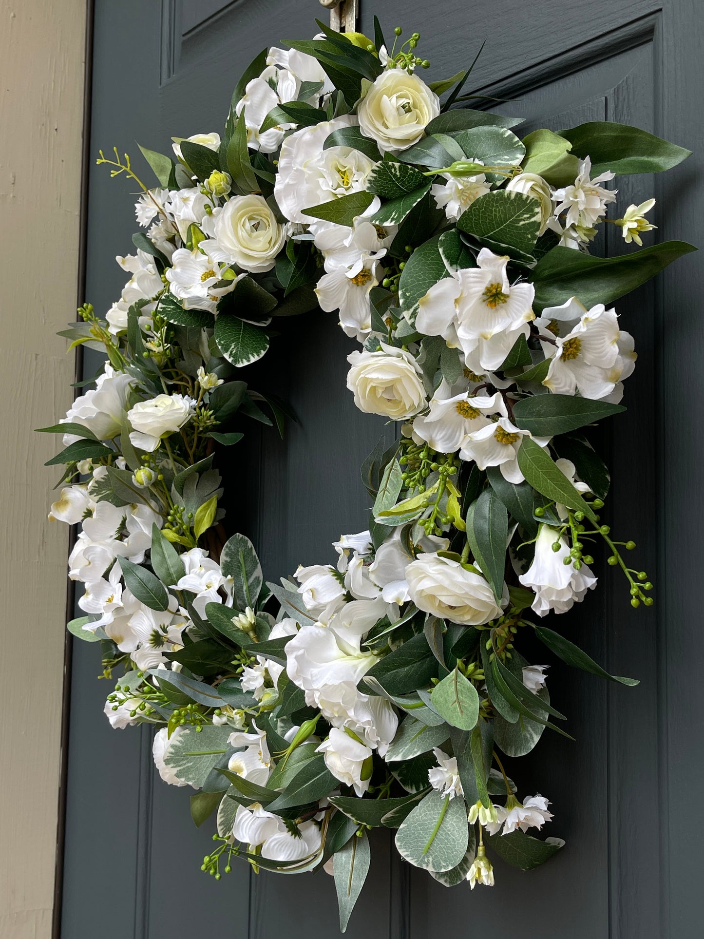 White & Green Dogwood, Ranunculus, and Eucalyptus Wreath