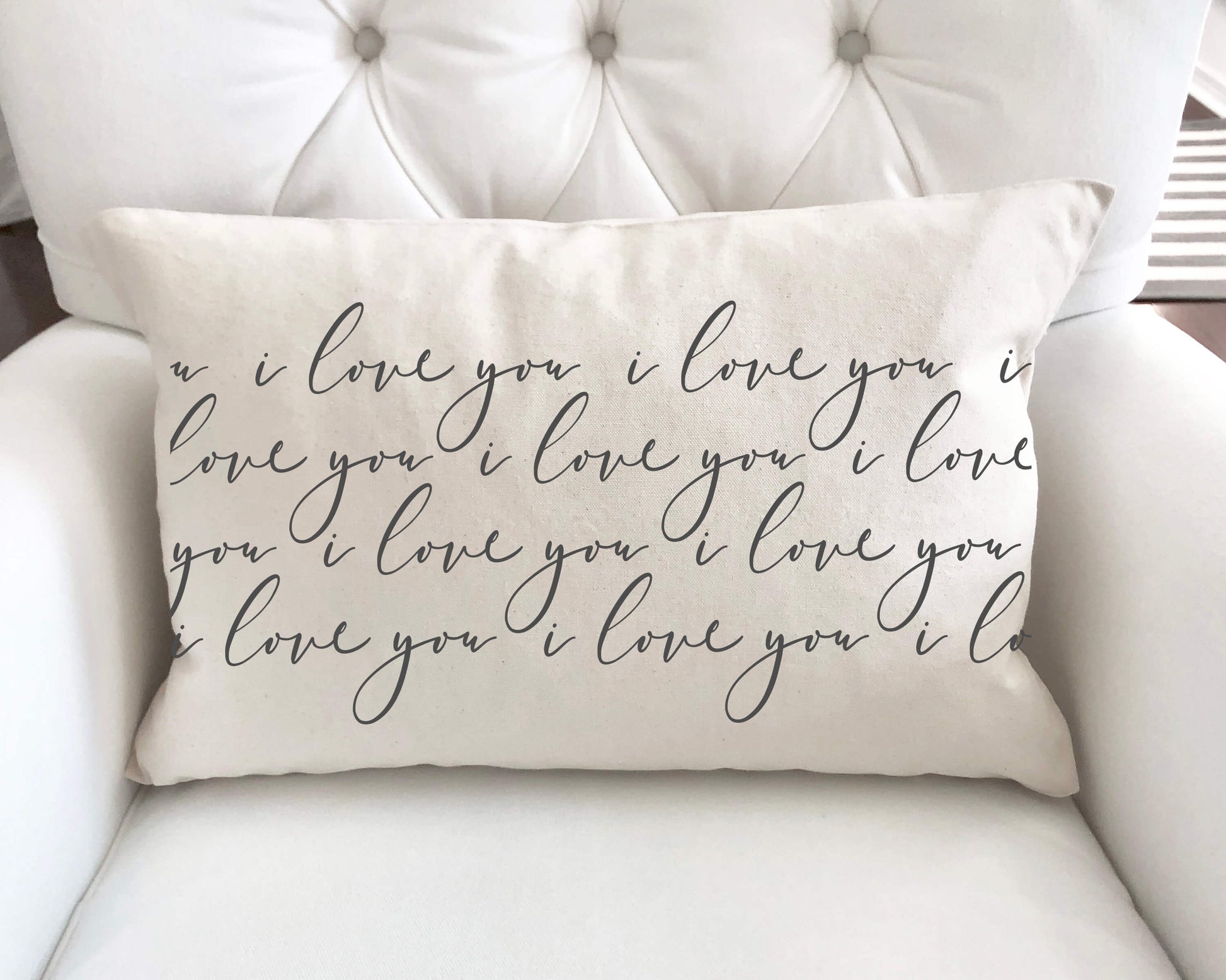 I Love You Pattern Charcoal Valentine's Day Pillow Cover on a white armchair with elegant script design.