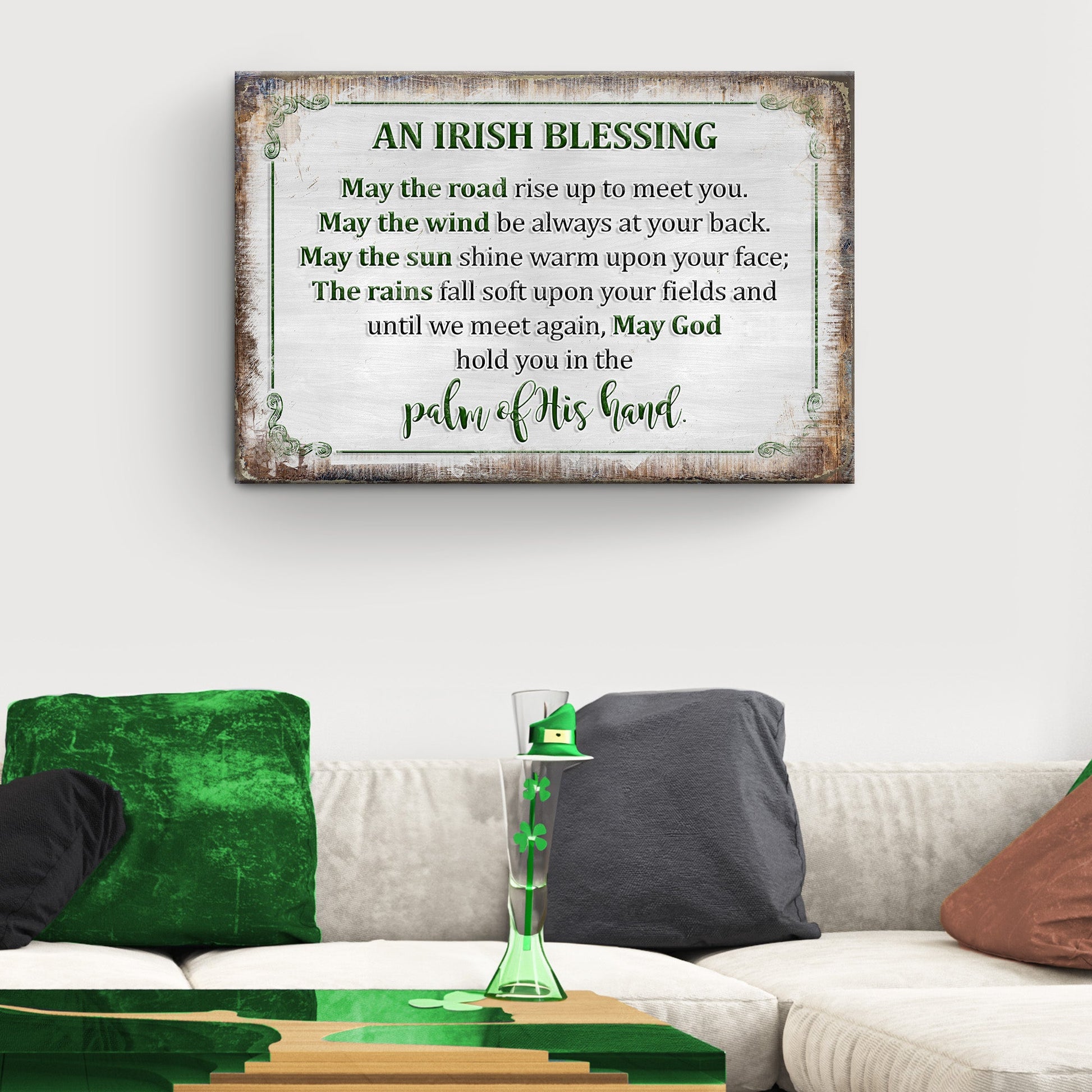 Decorative wall sign with an Irish blessing above a sofa with colorful cushions.