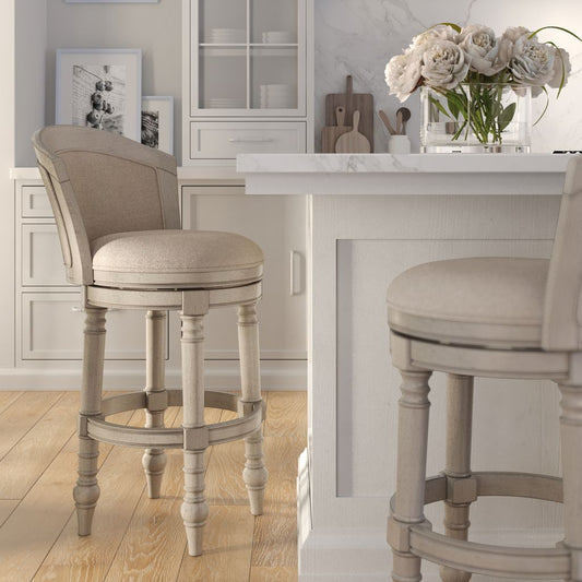 Kitty Hawk Swivel Stool in Uptown Grey & Beige at a kitchen counter with flowers.