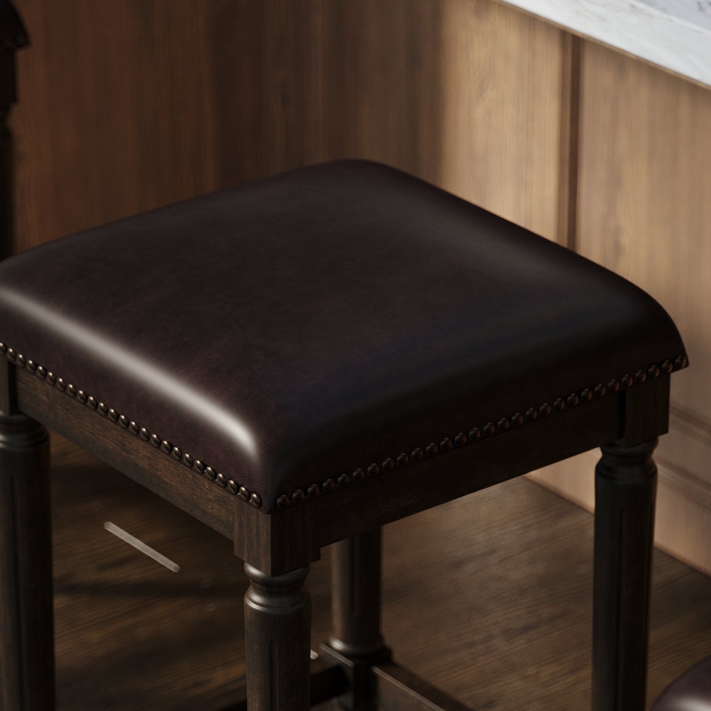 Asheville Stool in Walnut Finish with dark seat cushion and nail head detailing, perfect for kitchen or bar.