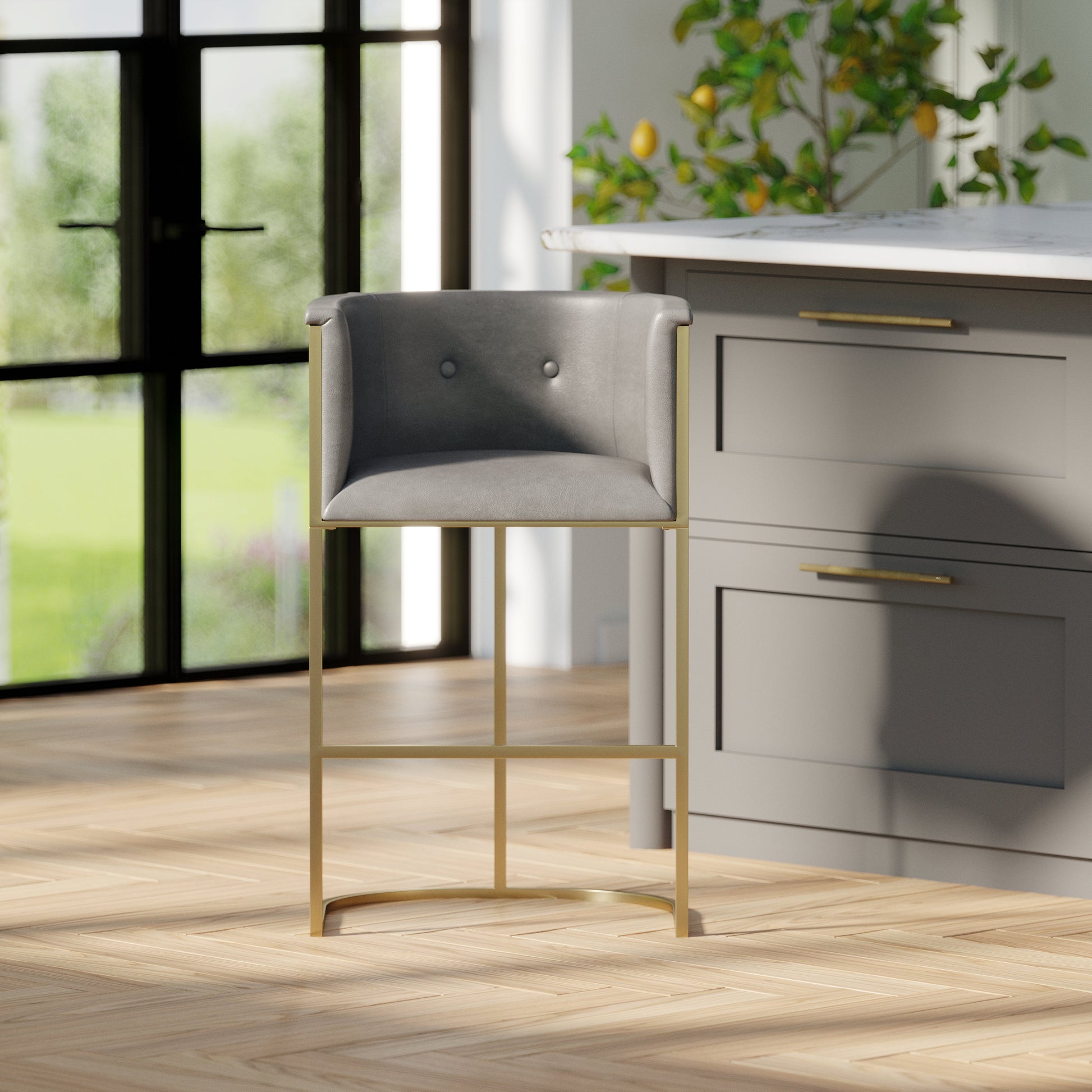 Winston Barstool in Grey with brass accents in a modern kitchen setting