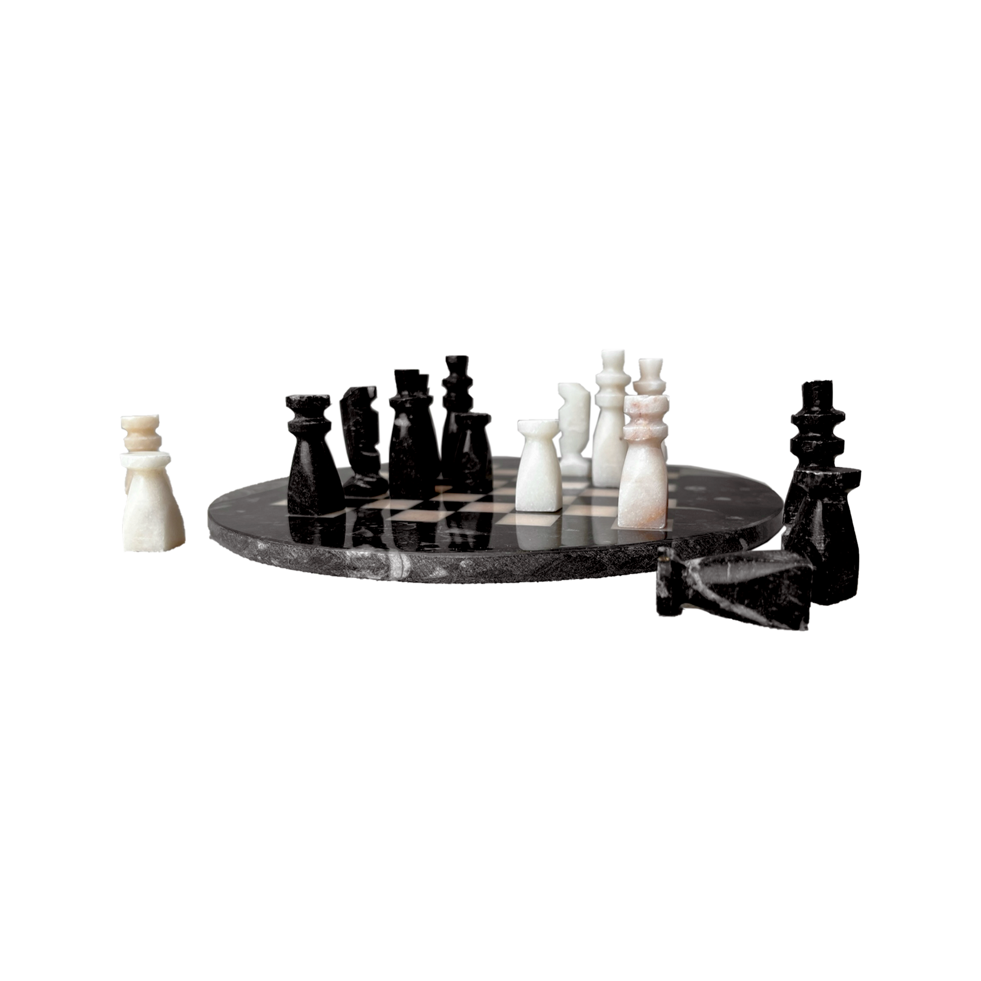 Stone Chess Set featuring black and white handmade stone pieces on a circular board, showcasing artisanal craftsmanship.