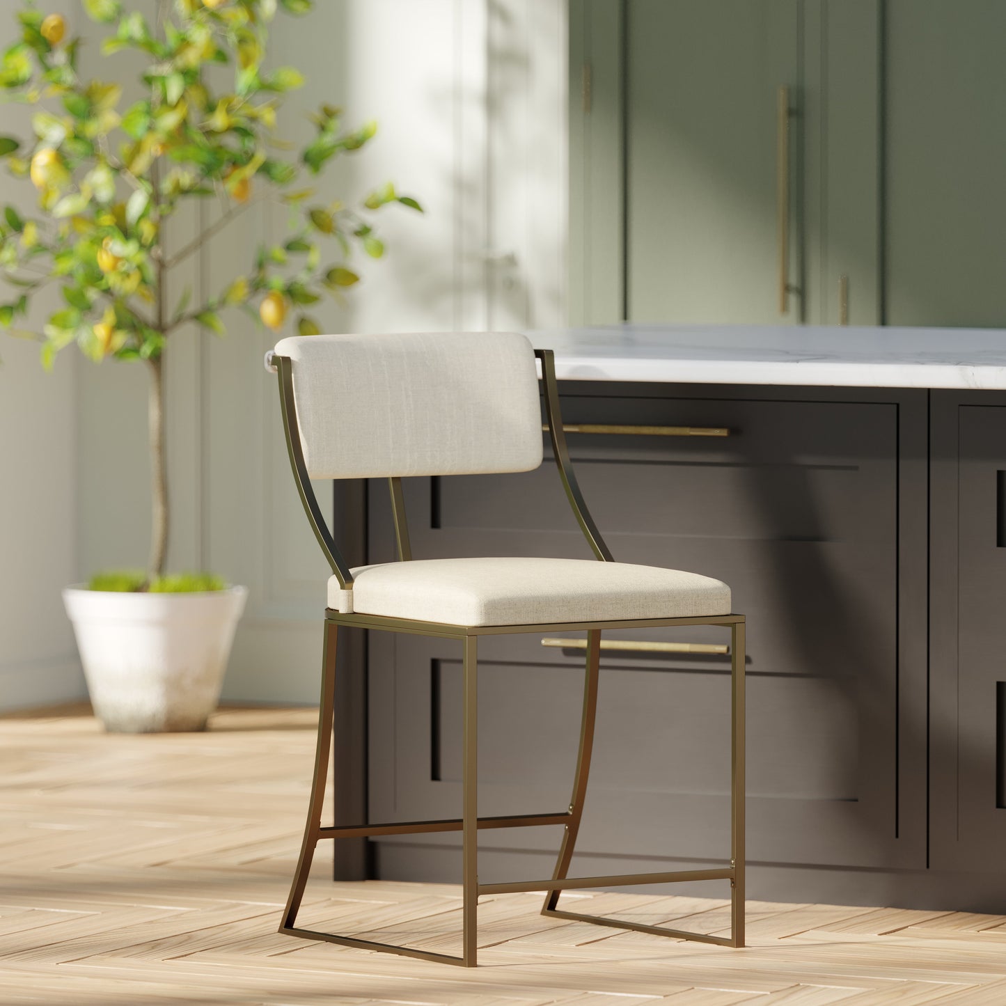 Durham Metal & Upholstered Barstool with plush linen seat and antique brass finish in a modern kitchen setting.