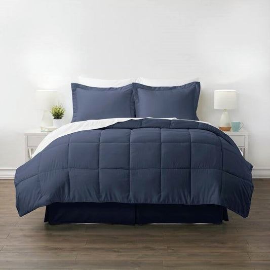 Twin Microfiber 6-Piece Reversible Bed-in-a-Bag Comforter Set Navy displayed on a bed with matching pillows.