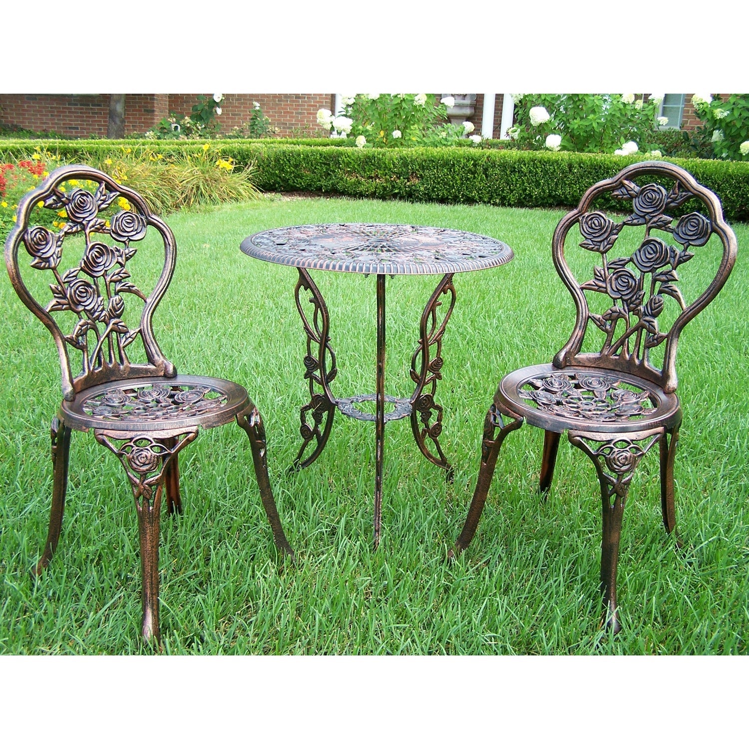 Bronze garden set with table and chairs on grass