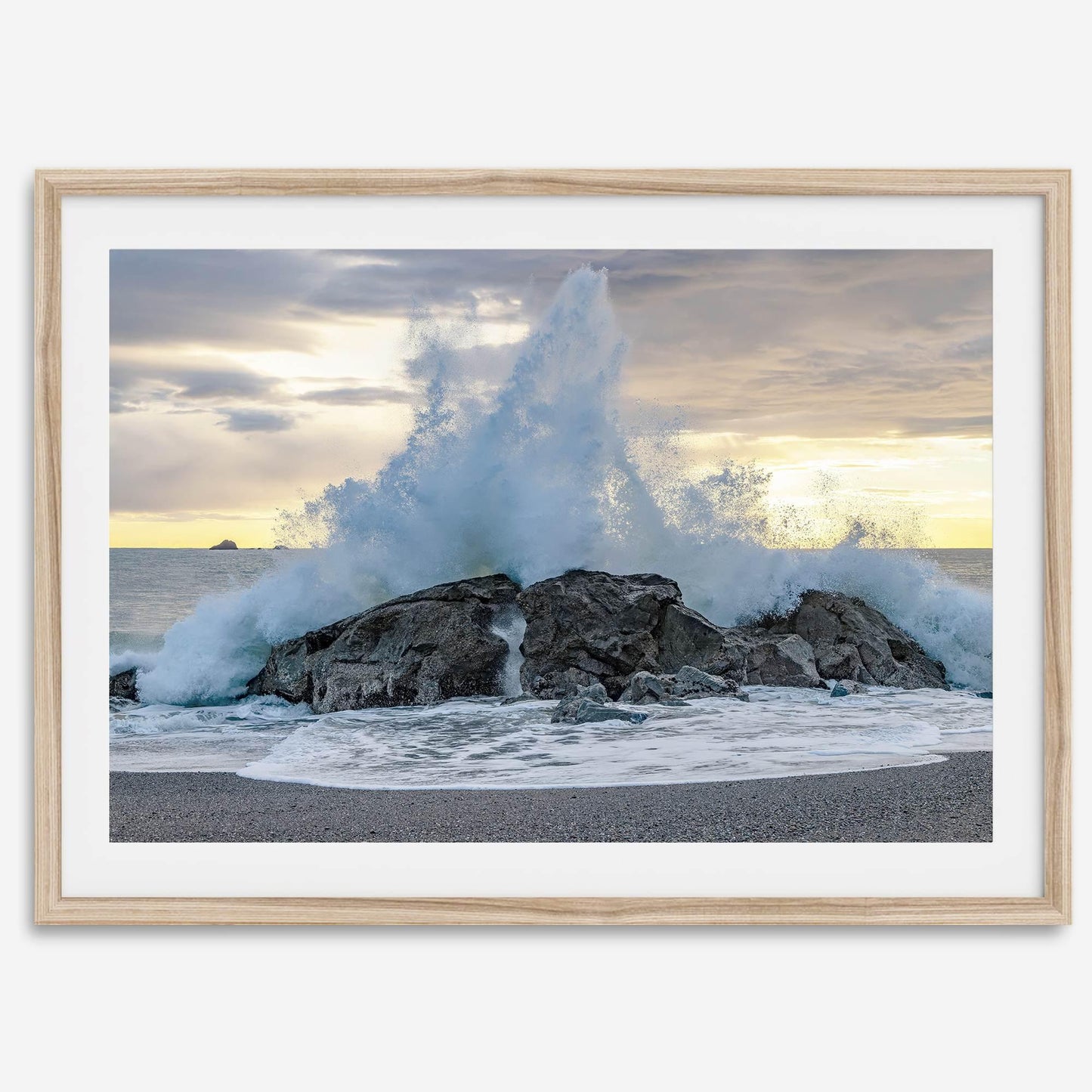Liquid Fire - powerful ocean wave crashing on a rocky beach in California, showcasing the beauty of nature.