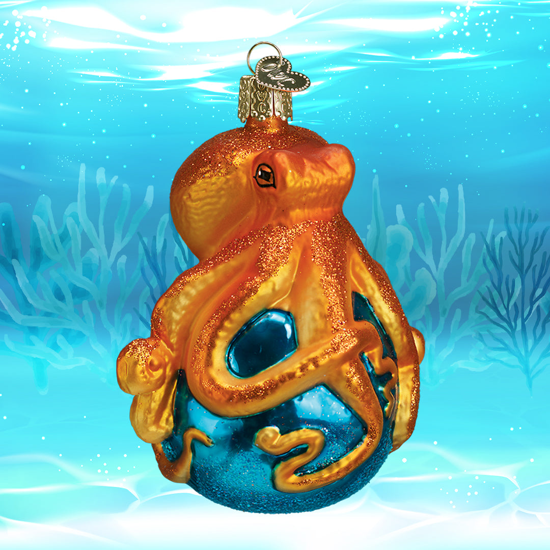 Glass ornament of an octopus on a blue sphere with an underwater background