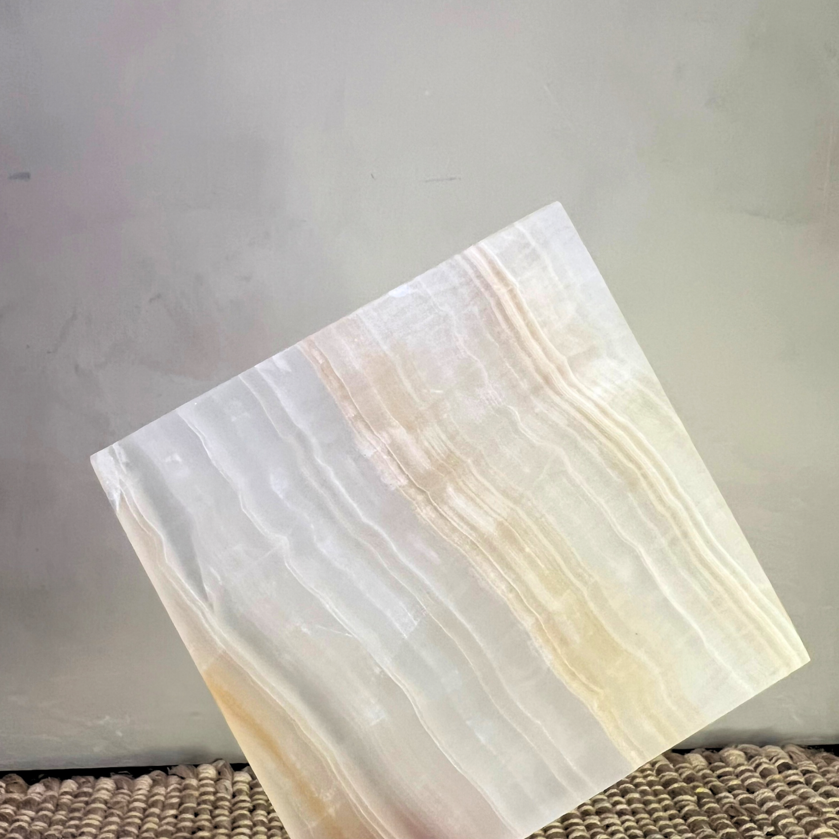 Onyx Coasters - Caramels showcasing a unique honed finish and elegant pattern variations, perfect for protecting surfaces.