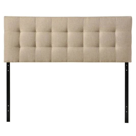 Beige tufted headboard with black metal legs on a white background