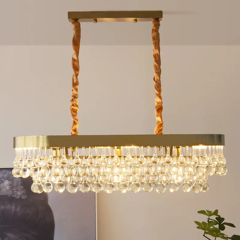 Elegant Round Water Drop Golden Chandelier - A Postmodern Light Luxury Fixture for Living Rooms, Bedrooms, and Dining Spaces