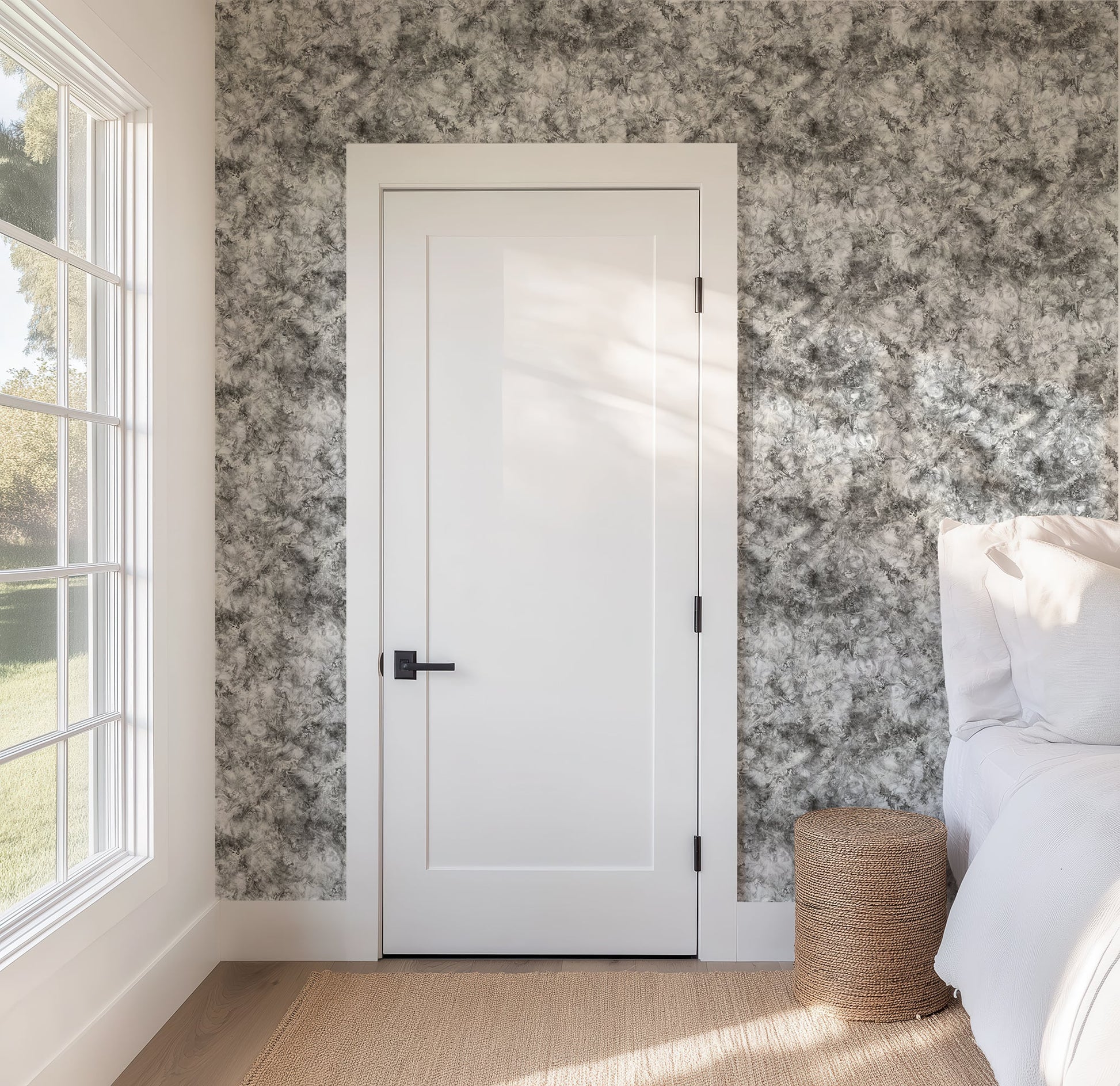 Subtle Marble Wallpaper in Modern Mineral Tones featured on a bedroom wall with a white door.