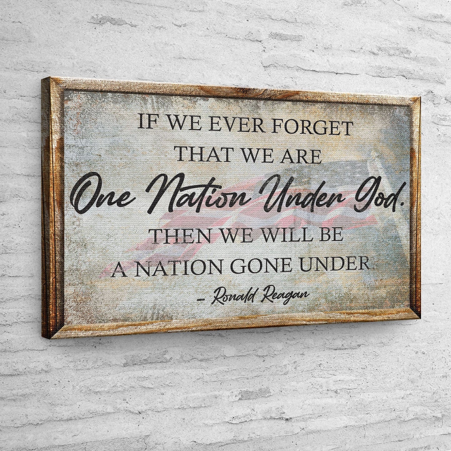 Wooden sign with a quote by Ronald Reagan on a gray brick wall.