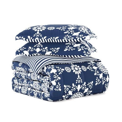 Twin 3-Piece Navy Blue White Reversible Floral Striped Comforter Set stacked with floral designs on navy background.