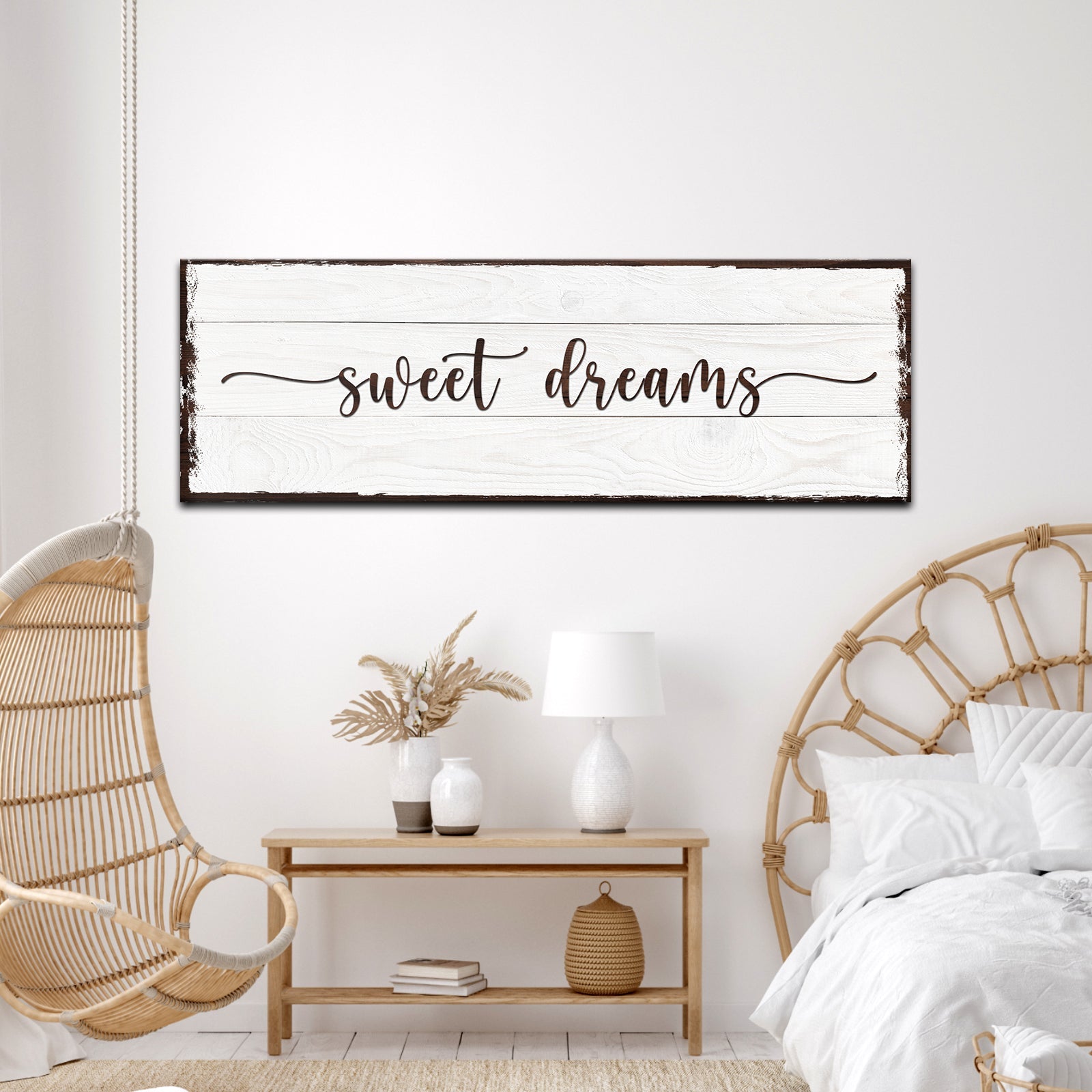 Bedroom with 'sweet dreams' sign, hanging chair, and wooden nightstand.